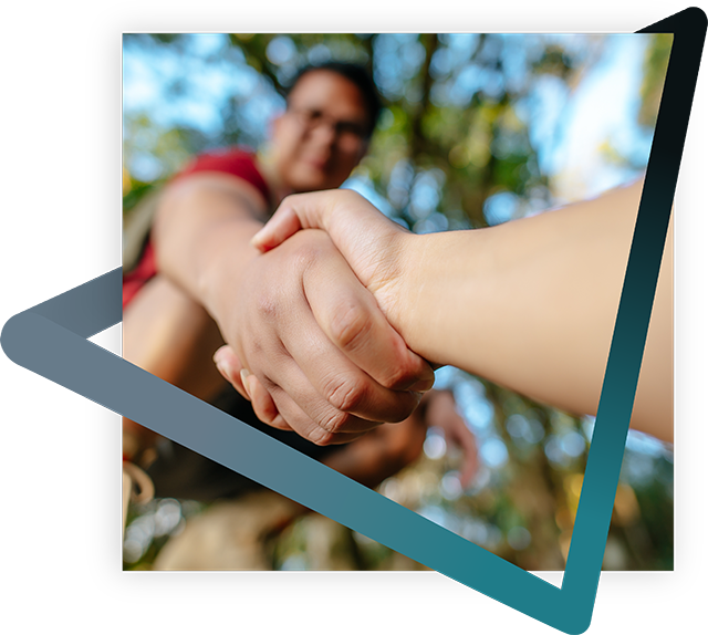 Close-up of two people shaking hands.